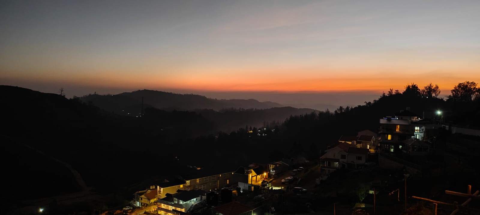 Sunset over the tea garden hills, seen from the property